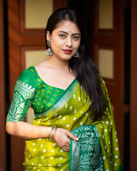 Parrot Green Soft Jute Silk Bandhni Print Saree With Dark Green Blouse