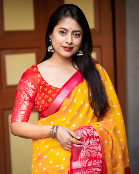 Yellow Red Soft Jute Silk Bandhni Print Saree With Red Blouse
