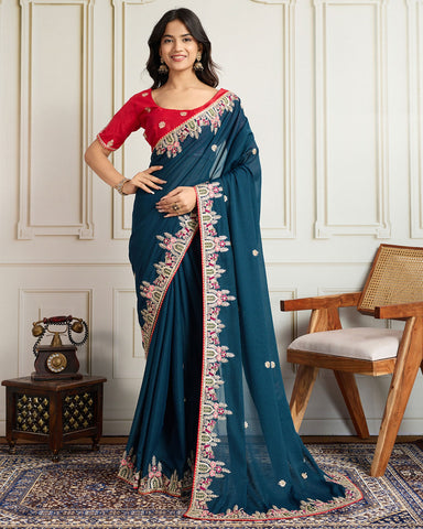 Blue Georgette Saree With Embroidered Art Silk Red Blouse For Women
