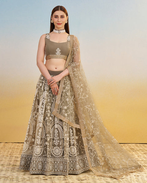 Ivory Thread & Sequins Work Customized Women Net Lehenga Choli With Embroidered Dupatta
