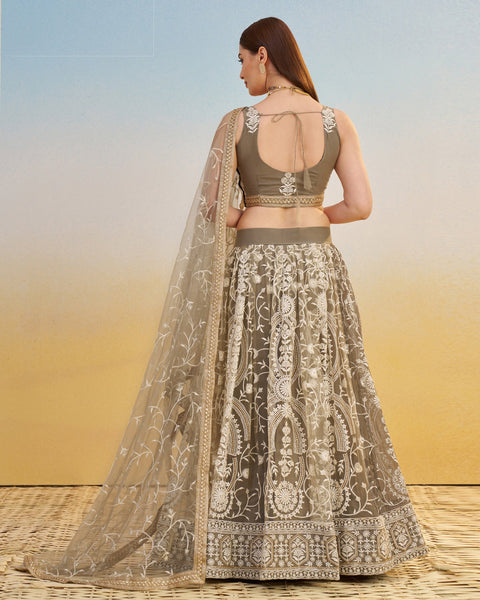 Ivory Thread & Sequins Work Customized Women Net Lehenga Choli With Embroidered Dupatta