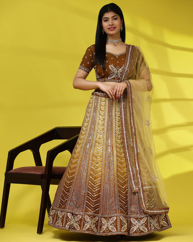 Brown Sequenced Lehenga Choli In Fancy Net Fabric With Net Dupatta