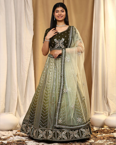 Green Sequenced Lehenga Choli In Fancy Net Fabric With Net Dupatta
