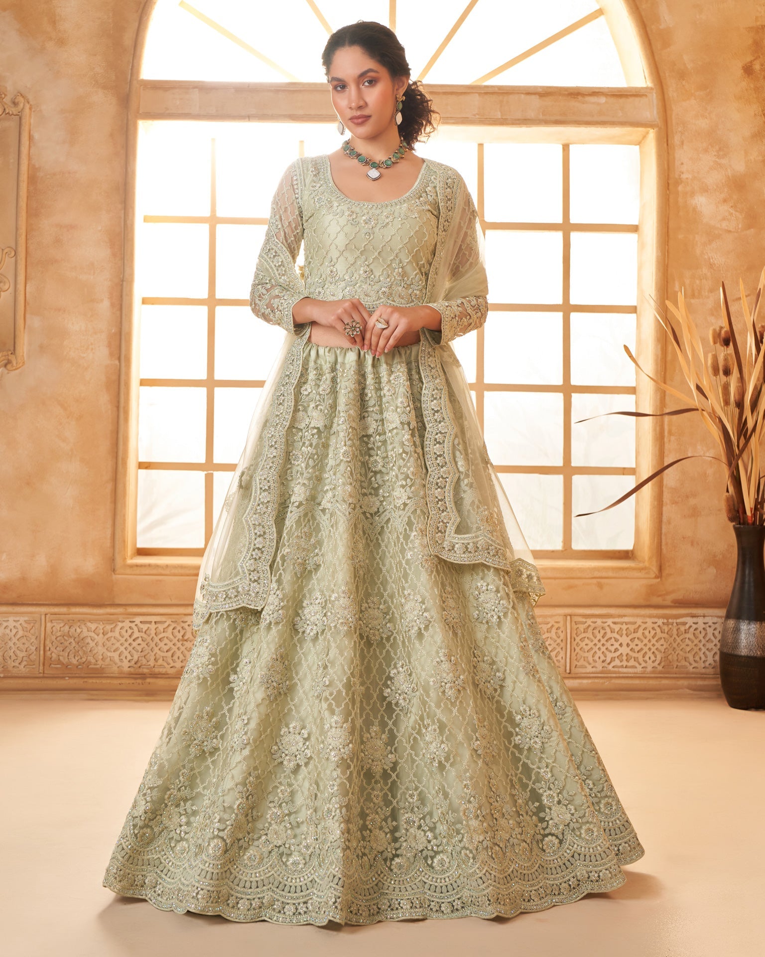 Light Green Net Thread & Stone Work Women Unstitched Lehenga Choli With Net Dupatta