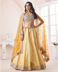 Yellow Mirror Work Georgette Embroidered Lehenga Choli With Net Embroidered Dupatta